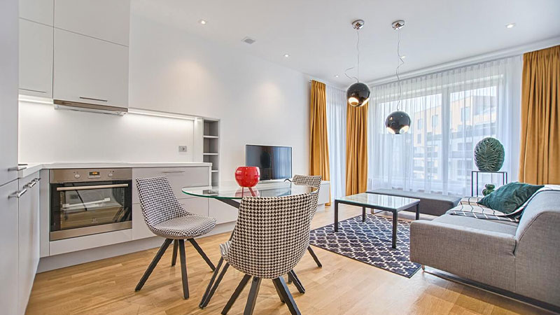 two chairs with glass table on living room.jpg